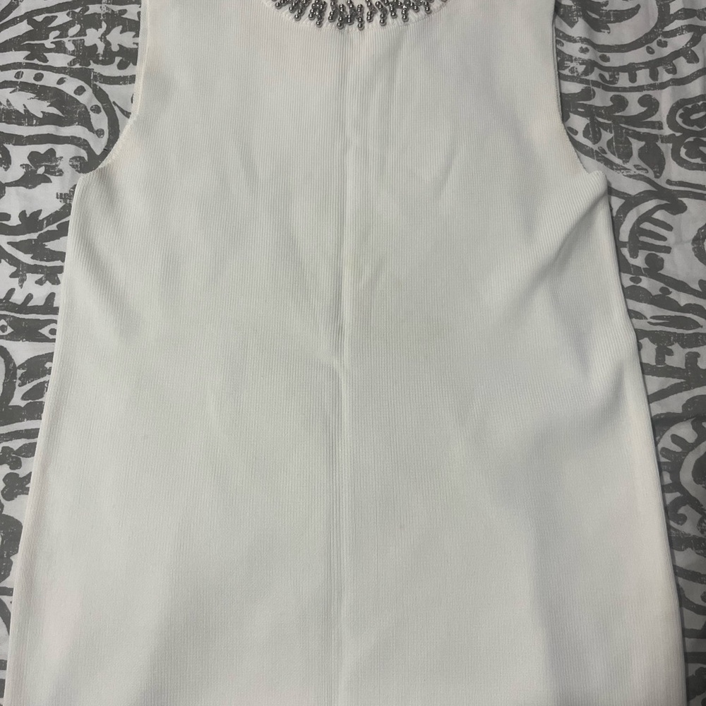 Elegant White Sleeveless Dress with Embellished Neckline